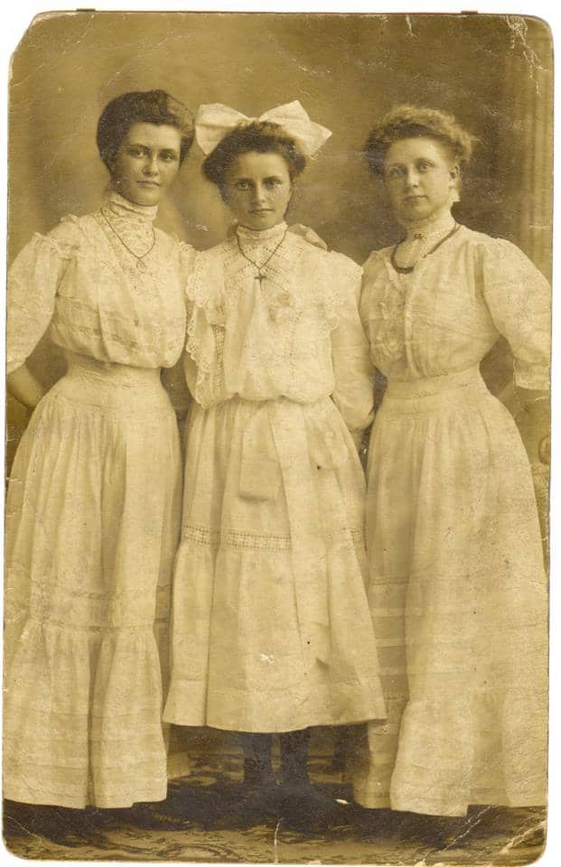 Old family photos can be preserved electronically by using a cloud service or storing on external drives.