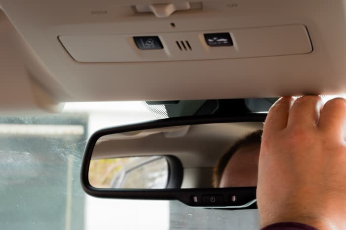 Adjust your side and rear-view mirrors so you can see what's behind you and to the side.