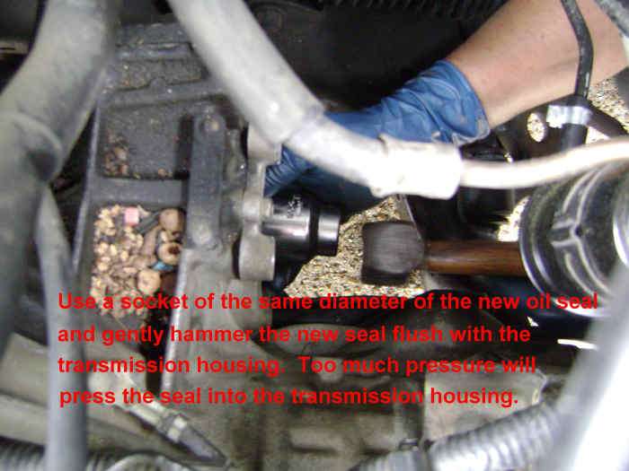 Replacing the CV Axle Shaft and Output Shaft Seal, or Replacing a CV