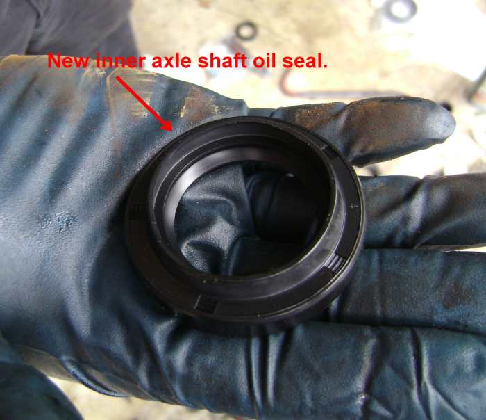 Replacing the CV Axle Shaft and Output Shaft Seal, or Replacing a CV