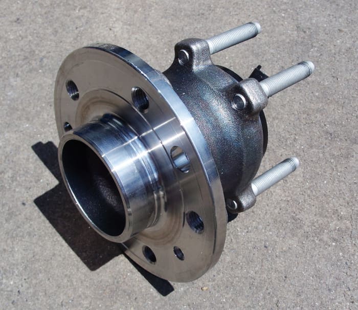The wheel bearing is pressed into a hub.
