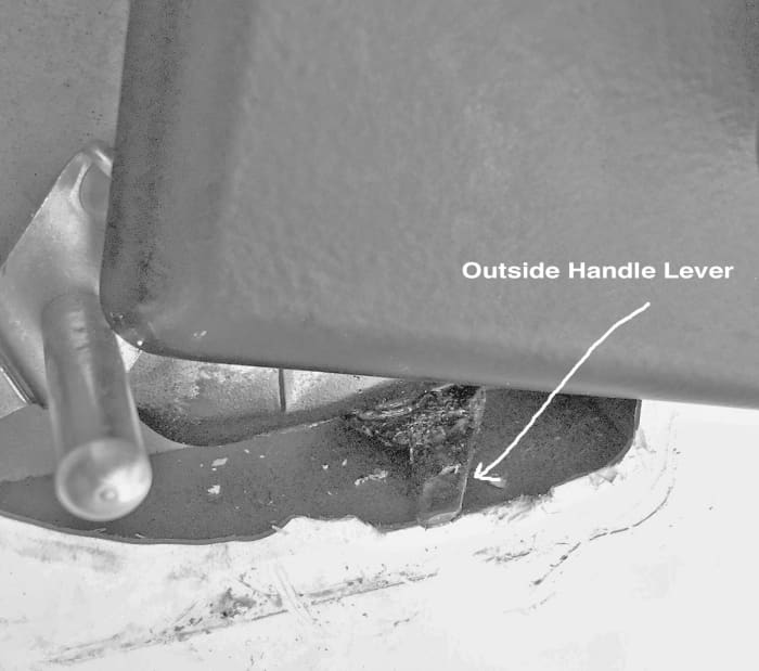 Interior view of the outside handle lever that needed repairing.