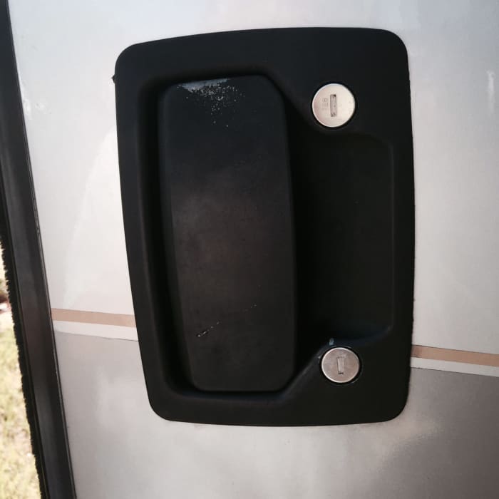 The handle and lock on the door of my RV.