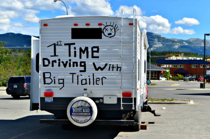 An actual photo taken of an RV that obviously is being driven by a new RVer. Kind of a warning to other drivers or at least a plea to be patient!