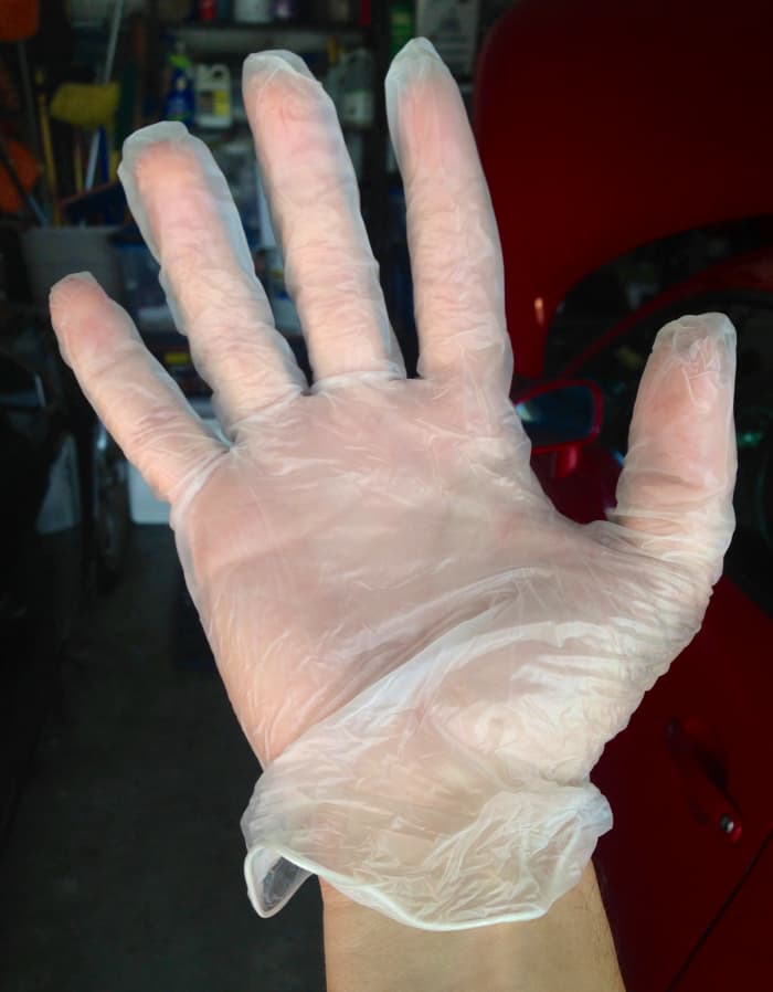 Use a q-tip or wear a glove when applying anti-seize to spark plug threads. It can irritate your skin.