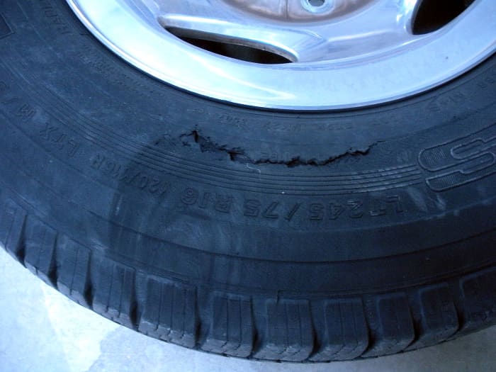 This is a bad crack in the sidewall. It seems to have opened up suddenly, as it was not there a couple of weeks ago.