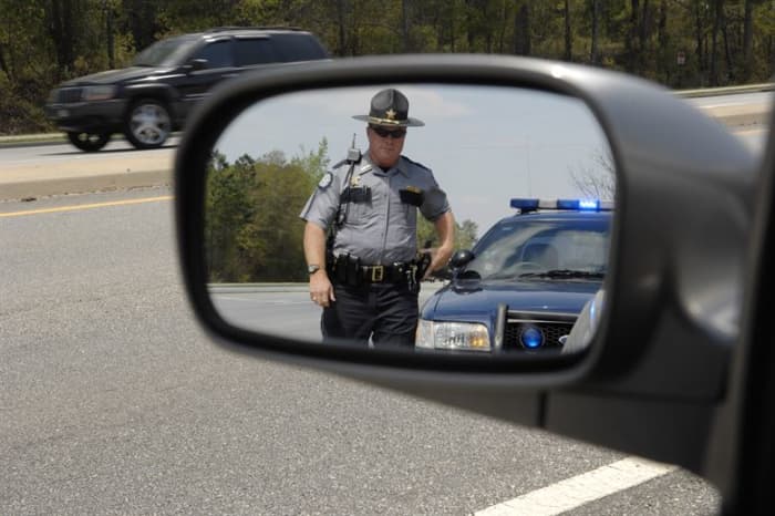 How often have you seen an aggressive driver and said “There’s never a cop around when you need one?” Well, here comes one now.