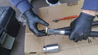 Infiniti I30 / Nissan Maxima Passenger Side Split CV Axle. Output shaft seal dust cover installation