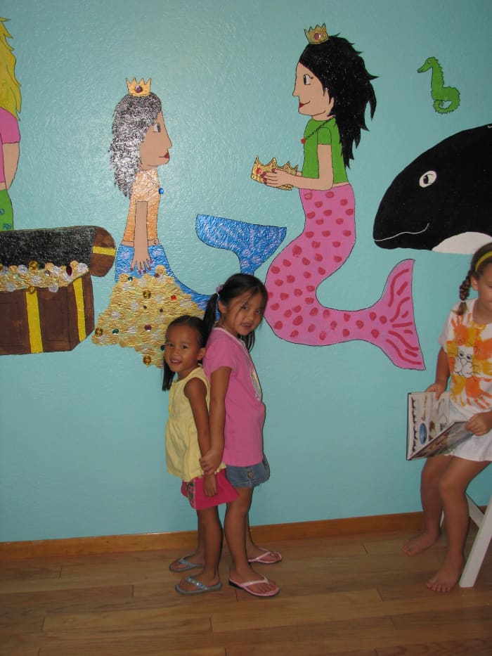 Little Mermaid Wall Mural: My oldest daughter designed this underwater mermaid mural for her three little sisters.