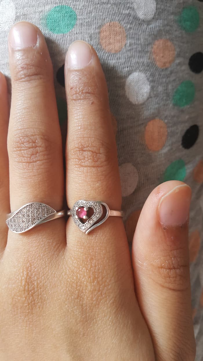 Notice the small bites on my thumb and forefinger. I had received them from my hand-raised lovebird Mumu. Please do take care as these bites sting and draw blood as well.