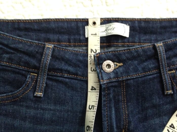 The dip refers to the difference in inches between the top front of the waistband and the back side when the seams are aligned.