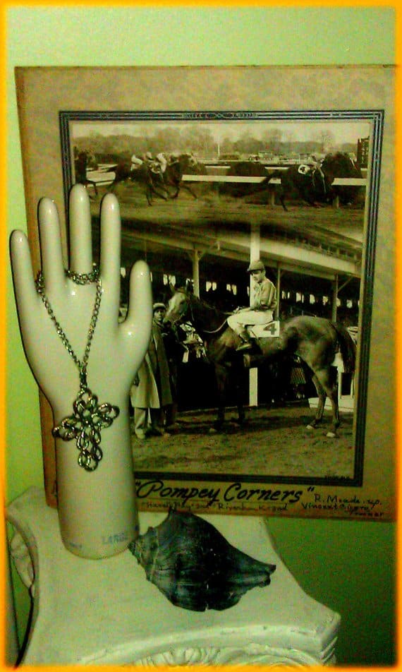 Vintage porcelain, vintage photographs or pictures, vintage jewelry, vintage seashell. All these things in this photo could be sold on Etsy. Etsy considers vintage something only 20 years old.