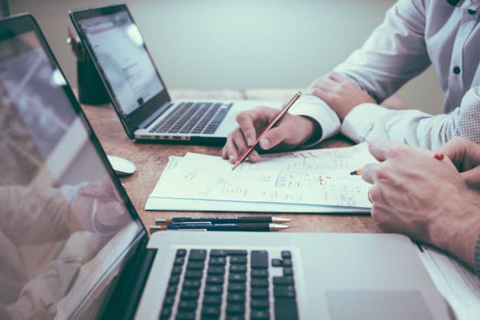 When you need a solution to a vexing problem, do you stand over your staff and demand answers, or do you roll up your sleeves and work alongside them?