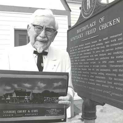 Colonel Sanders at place where Kentucky Fried Chicken started
