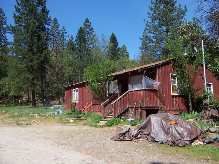 This is the house I moved out of—the little red cabin in the mountains. I loved living there, but I desperately needed a change.