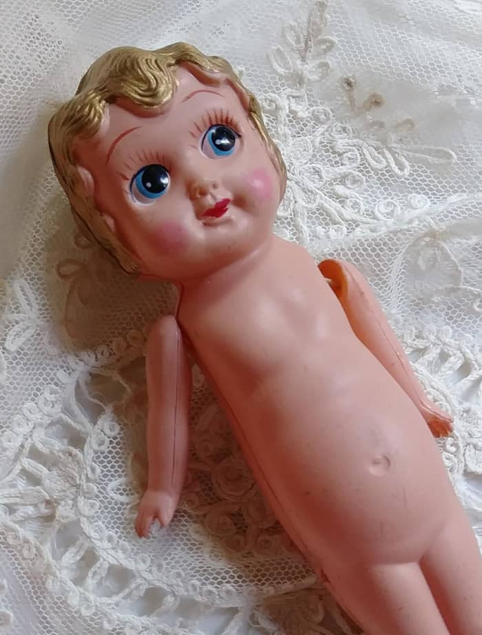 Estate Sale Treasures is a top seller on Etsy, and the photos never disappoint. This item was nailed on the first photo - it's clear, crisp and a pleasing background which does not detract from the little doll for sale.