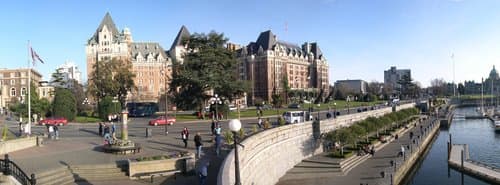 Victoria Waterfront at Empress Hotel. One summer I saw free tango lessons given on the Waterfront at a cafe. The Greek restaurant was also very good. The insect museum was fun and along the walkways we saw hand-carved doors. [Photo by avhell on flckr
