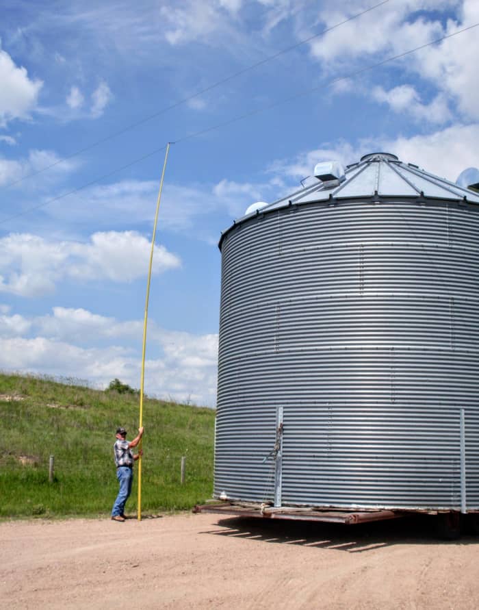 This is one of the tallest bins we've ever moved on a trailer. It was a wild move, as the bin didn't quite clear the power lines. Also notice that the lower sheets include stiffeners to prevent buckling.