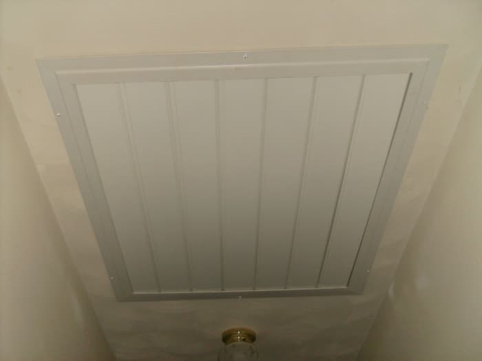 This is the attic fan that my stepdad installed in my hallway. The fan is installed up above the open slats (in the attic) which open when the fan is switched on. Remember to open the windows before switching on!