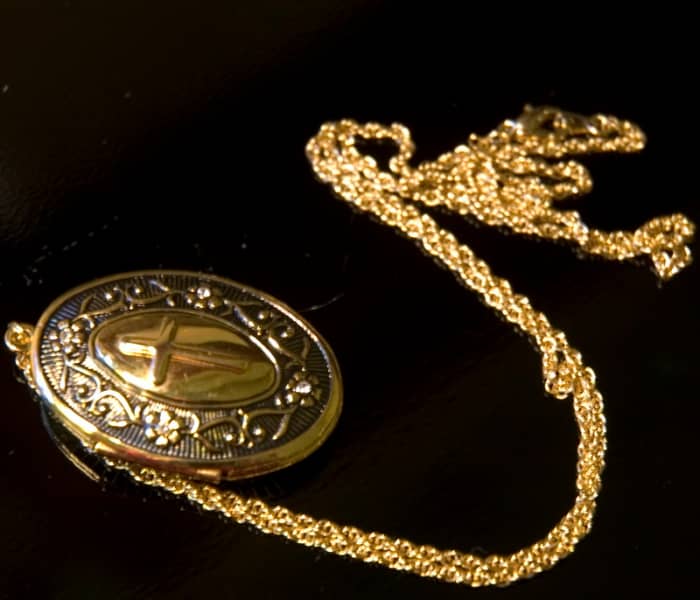 Certain items like lockets that have a lot of character or history are often worth more at auction than as scrap gold. 
