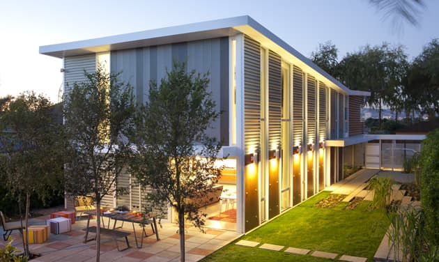 This "Sunlight Residence," by Proto Homes, built in Los Angeles, has 2,650 SF (incl. garage) of living space, 3 beds, and 2.5 baths. Based on its November 2011 sale, the home itself is valued at approx. $437,000.