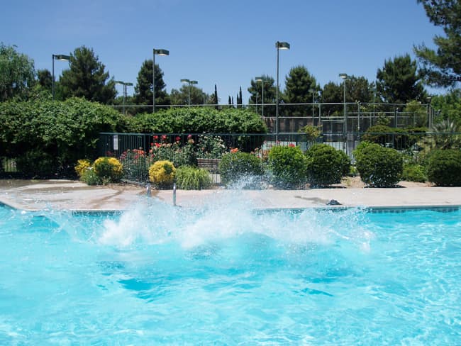 Cover your pool: There is a viscous liquid solution available that cuts down on pool evaporation. The liquid is nontoxic and most swimmers cannot tell it's there.