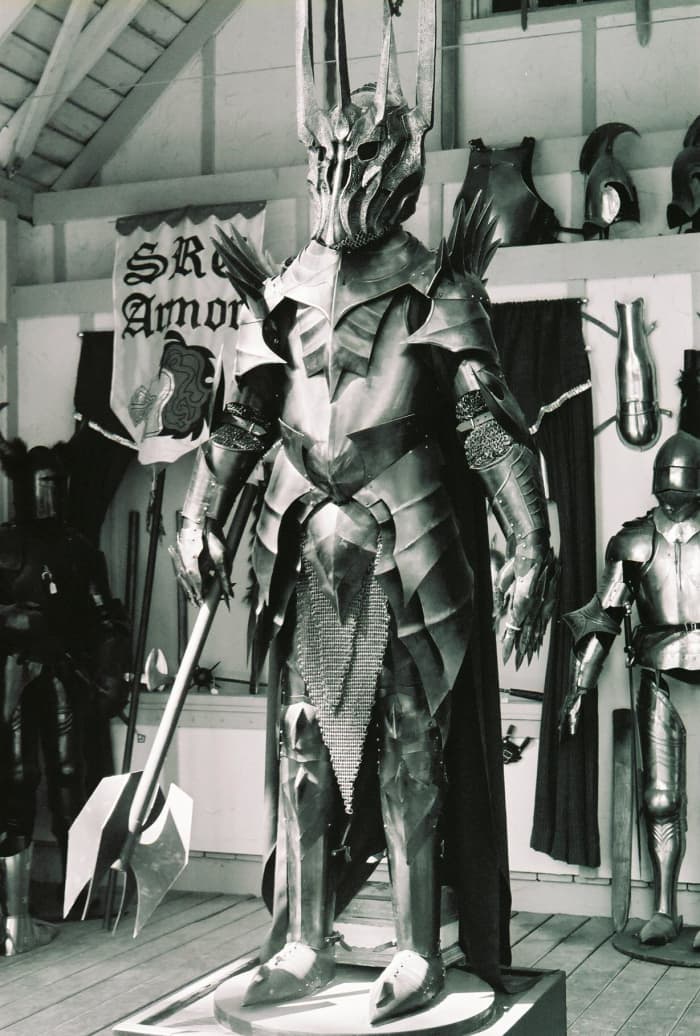 Replica armor of the Dark Lord of the Rings Sauron. The costume is the result of the positive synergy of a great team The figure shows the ultimate negative synergy - people and monsters working together for destruction, and undercutting one another.
