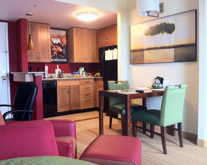 A hotel room with a kitchen in it can save you a lot of money on food on your vacation.