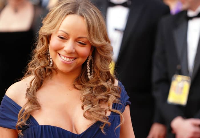 Pop Diva Mariah Carey's voice ranges more than five octaves, and she writes most of her own songs. On the list of best-selling female artists of all time, she ranks #3.