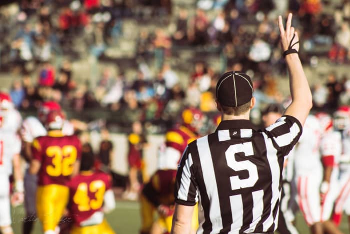 You don't have to referee other people's conflicts. (But it can sometimes be interesting to watch from the sidelines.) Managers, however, are often obligated to step in.