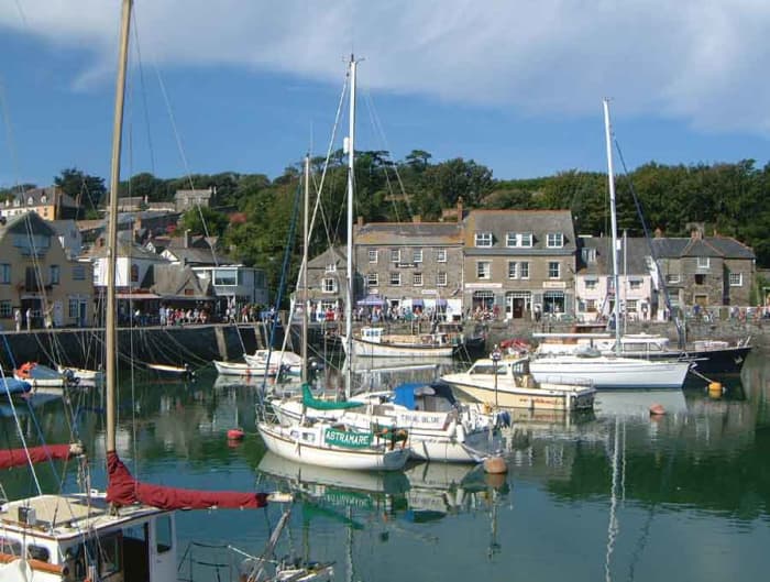 Padstow's harbour plays host to tourists and local fishermen alike.