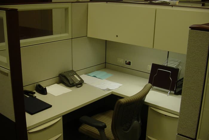 An empty piece of cubicle real estate shows little sign of its former tenant.