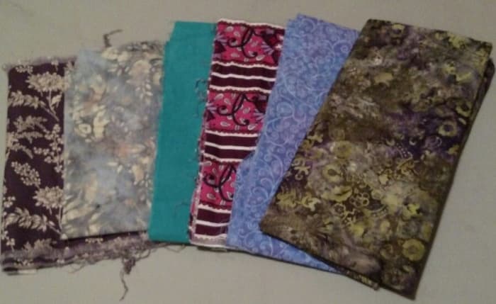 Batik Style Fabric Lot. This is how I sold it on eBay. The bag I purchased from the store contained much more fabric than what is pictured.