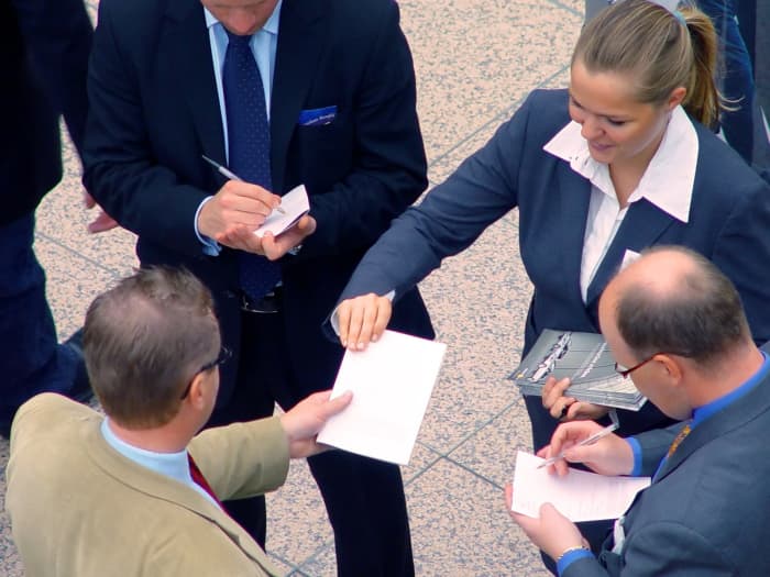 In-person networking can help you make connections and get the word out.