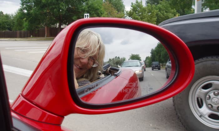 Carpooling with a friend in Colorado. We drove to the local reservoir, then up into the Rocky Mountains. She said carpooling with me was fun––that we went to places she'd never seen before.