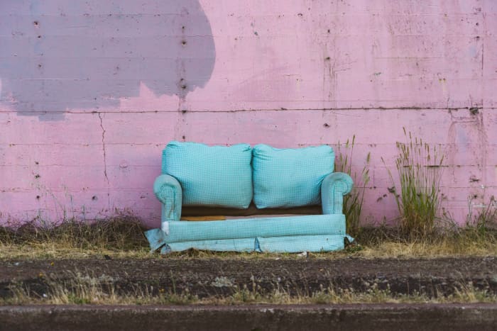 Is this sofa a mess, an eyesore, free stuff, or a good place to sleep? It depends on your perspective.