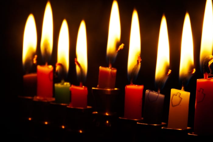 Hanukkah candles are lit in honor of the re-dedication of the Temple.