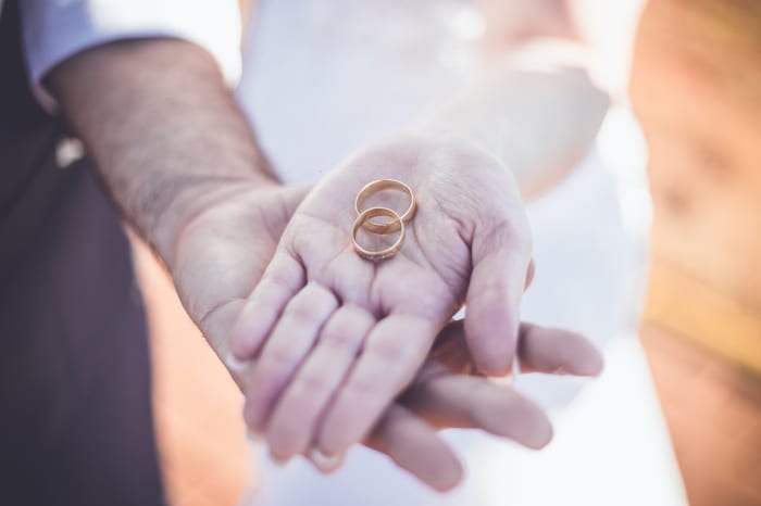A couple is more likely to have the groom take the bride's name than reverse the traditional roles of who gets down on bended knee and does the proposing.