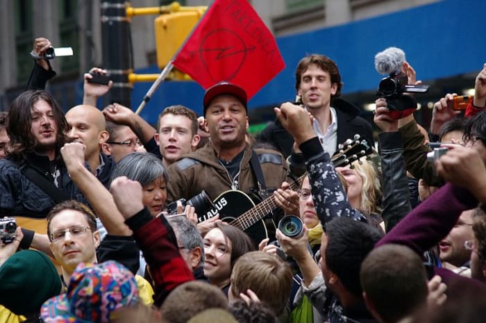 Tom Morello of Rage Against the Machine playing Occupy Wall Street. Tom Morello has also performed a reworked version of "The Ghost of Tom Joad" with Bruce Springsteen.