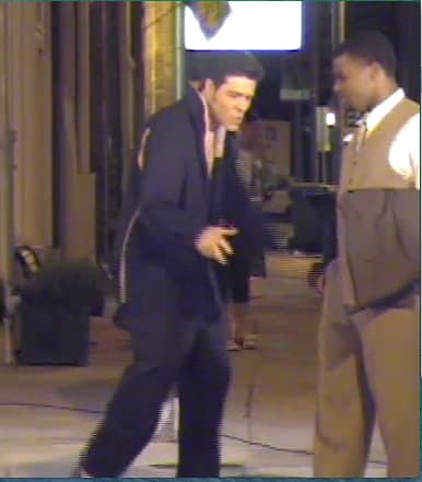 In this reenactment, Robert Henry, Beale Street Promoter and friend of young Elvis, looks on as the youth imitates his early idol Ukelele Ike.