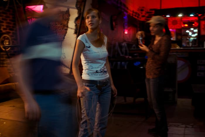 Honky tonks are country music bars. Usually they're small and not too classy, but that's the way patrons like them.