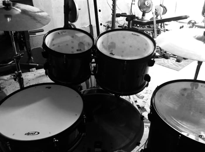 Save the kit for last! Start with the practice pad and drum lessons. Then, invest in a nice beginner kit once you have had time to get comfortable with the basics.