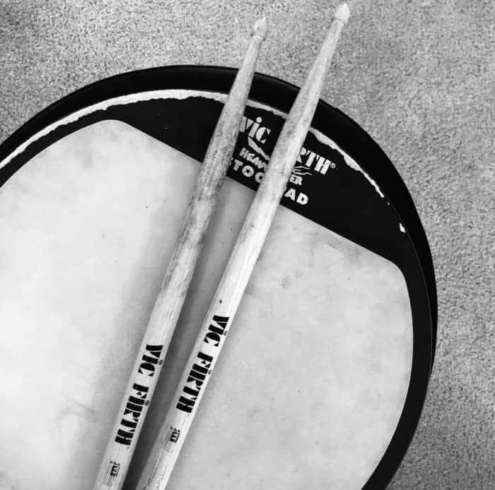 Practice, practice, practice! Practice pads and sticks are relatively cheap and a good way to get started with drumming.