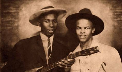 Whether or not that is really Robert Johnson on the left is a matter of some controversy and dispute.