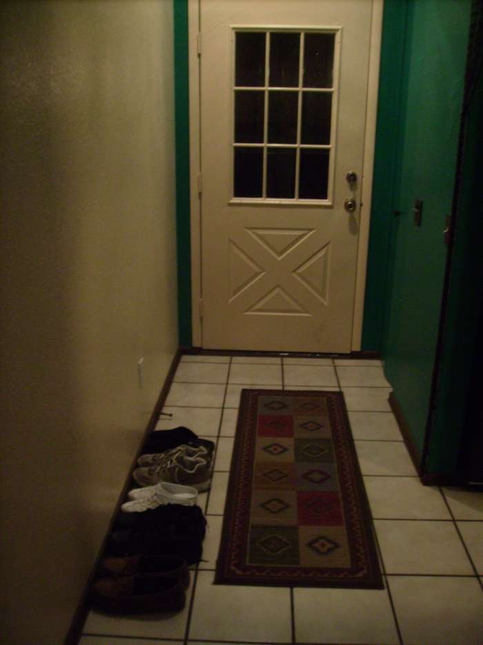 My new wife brought the Russian custom of removing shoes when entering the house to our home in Tucson, Arizona.