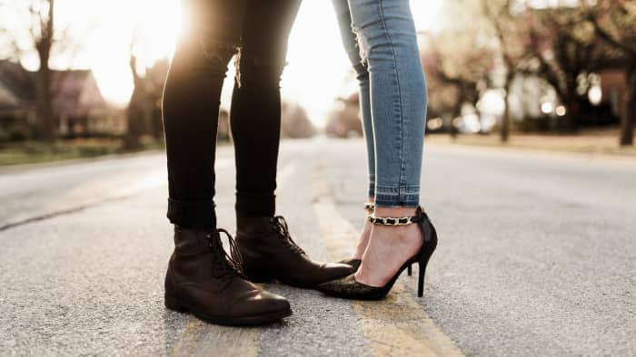 Wondering if your friend likes you? Take a peek at their feet—if they're pointed directly at you, it may be a sign they want to be more than friends.