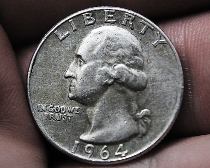 Place a quarter on the hand and slowly strike a key on the piano. Try to keep the quarter from falling off the hand. Begin with right hand followed by left hand.