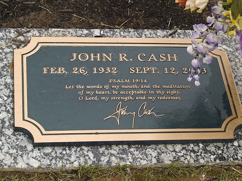 The grave of Johnny Cash in in Hendersonville Memory Gardens near his home in Hendersonville, Tennessee. He was buried next to his wife, June, who died several months before him. Some people believe that his broken heart brought on his death.