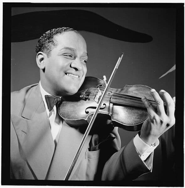 Eddie South playing some violin jazz. Eddie, like all jazz greats, knew how to keep the 'through-line' going. Photo by William Gottlieb, courtesy Library of Congress and Wikimedia Commons.
