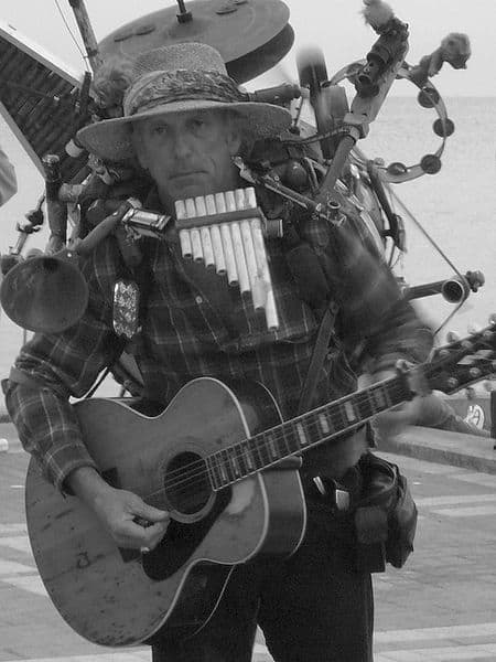 Key West street musician. This guy really has to concentrate. Image courtesy jster and Wikimedia Commons.